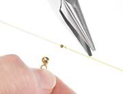 Attaching bead tip